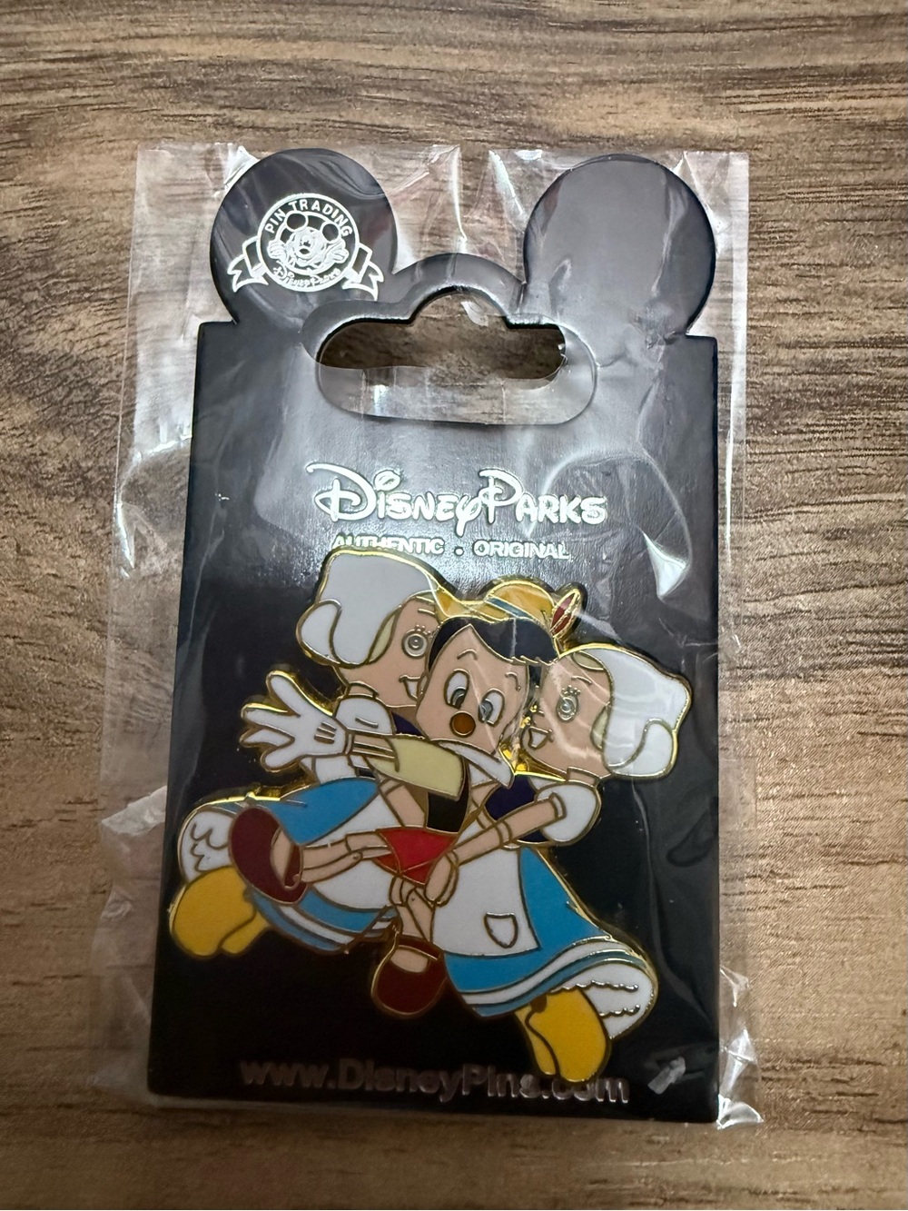 Disney Pinocchio Enamel Pin with Blue, Yellow & Red Accents - Disney Parks